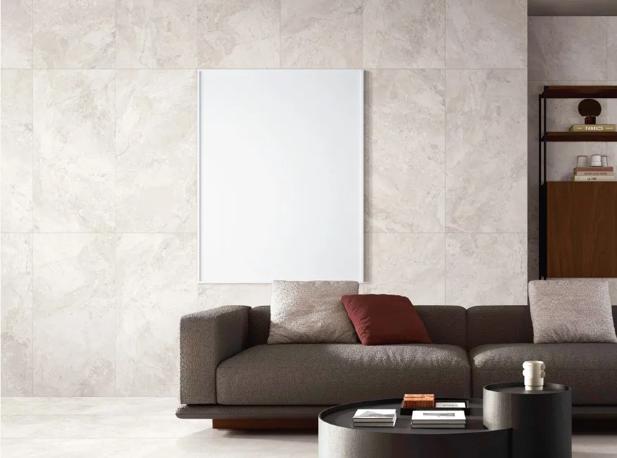 Dreamy Cream marble-look porcelain wall and floor tiles installed in a contemporary living room