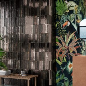 Magnetism Graphite metallic-look matt ceramic wall tile 63x250mm installed as a contemporary feature wall with deep graphite tones and subtle metallic variation.