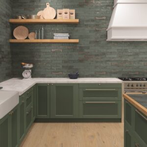 Magnetism Green metallic-look matt ceramic wall tile 63x250mm installed as a contemporary bathroom feature wall with rich green tones and subtle metallic variation.