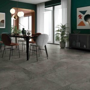 Mars Graphite stone look porcelain tile in a modern dining room with dark graphite tones and natural stone texture