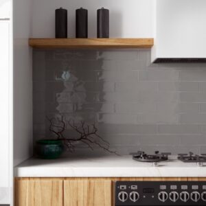 Masia Dark Gris gloss handmade-look subway wall tiles in a modern kitchen splashback